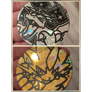 Pokémon Coins Charizard and Zeraora
